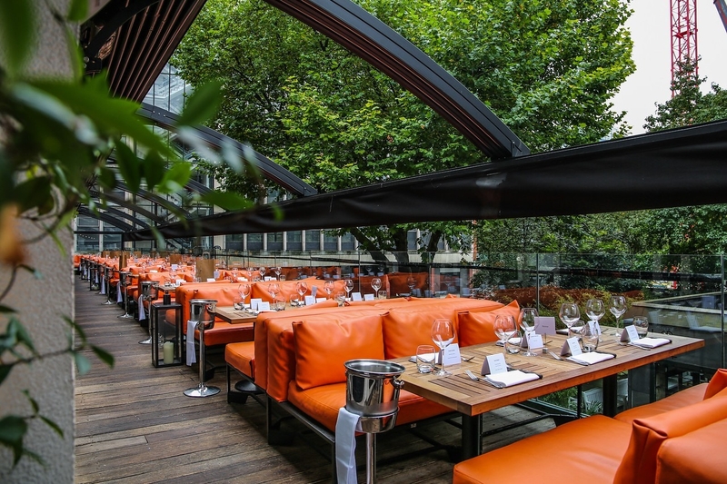 The Terrace With Orange Seating At Restaurant Bar And Grill Manchester