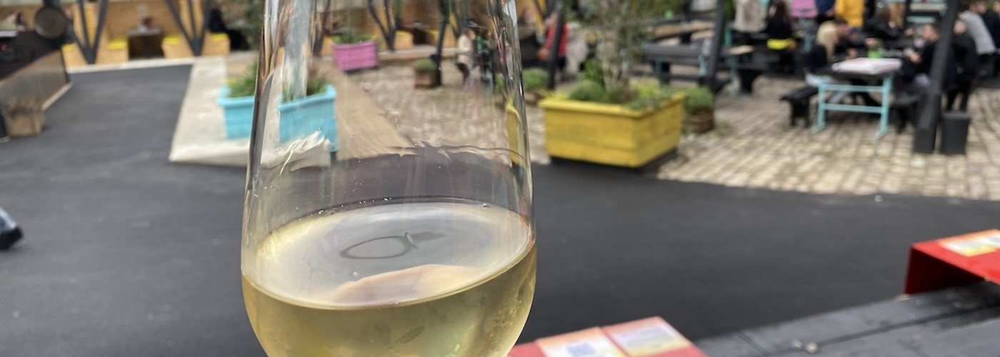 A Cold Glass Of Wine In An Outdoor Beer Garden At Freight Island