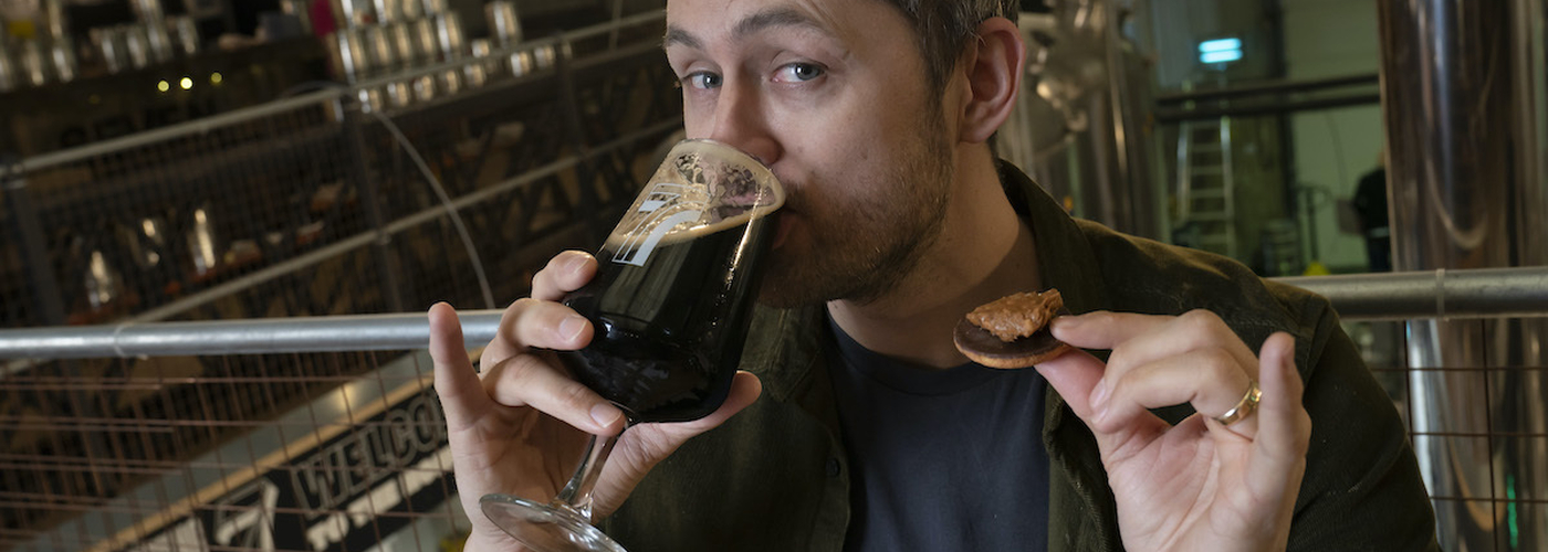 Kit Mcavoy From Seven Brothers Drinking Stout And Holding A Jaffa Cake With Peanut Butter On Top 800 1200