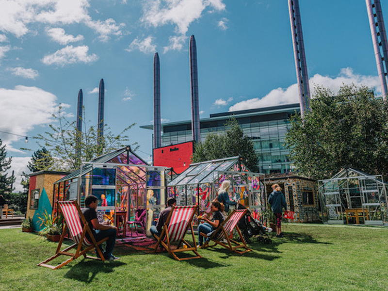 Greenhouses Pods And Boxes On The Docks With Deckchairs For Outdoor Drinking And Dining In Salford Quays