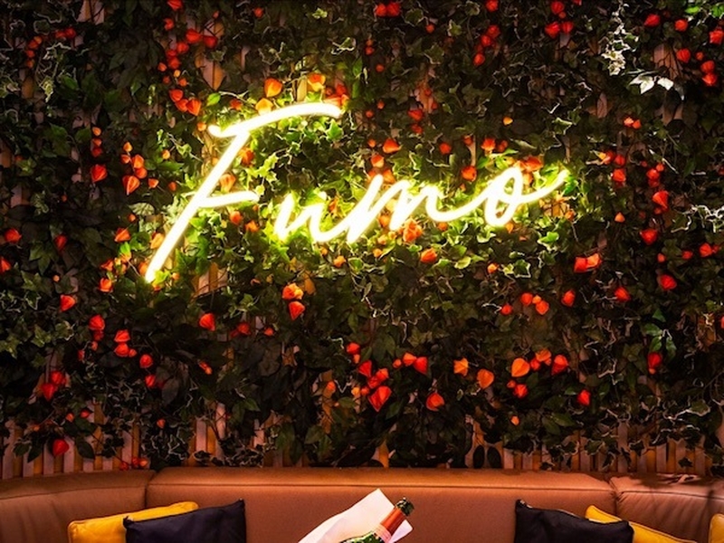 Fumo Bar And Grill Manchester Neon Sign On Living Wall