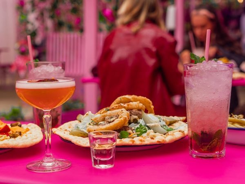 A Cocktail And Food And Bright Pink Boujee On Peter Street Manchester