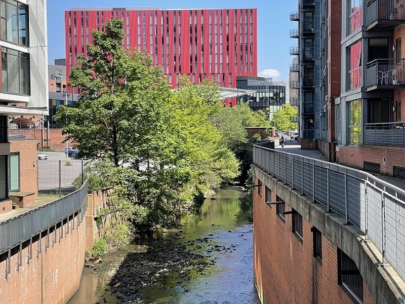 View From The New Square At Deansgate Square Along The River Medlock Toward First Street