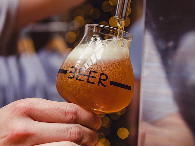 A Glass Of Beer Being Poured At Manchester Craft Beer Festival