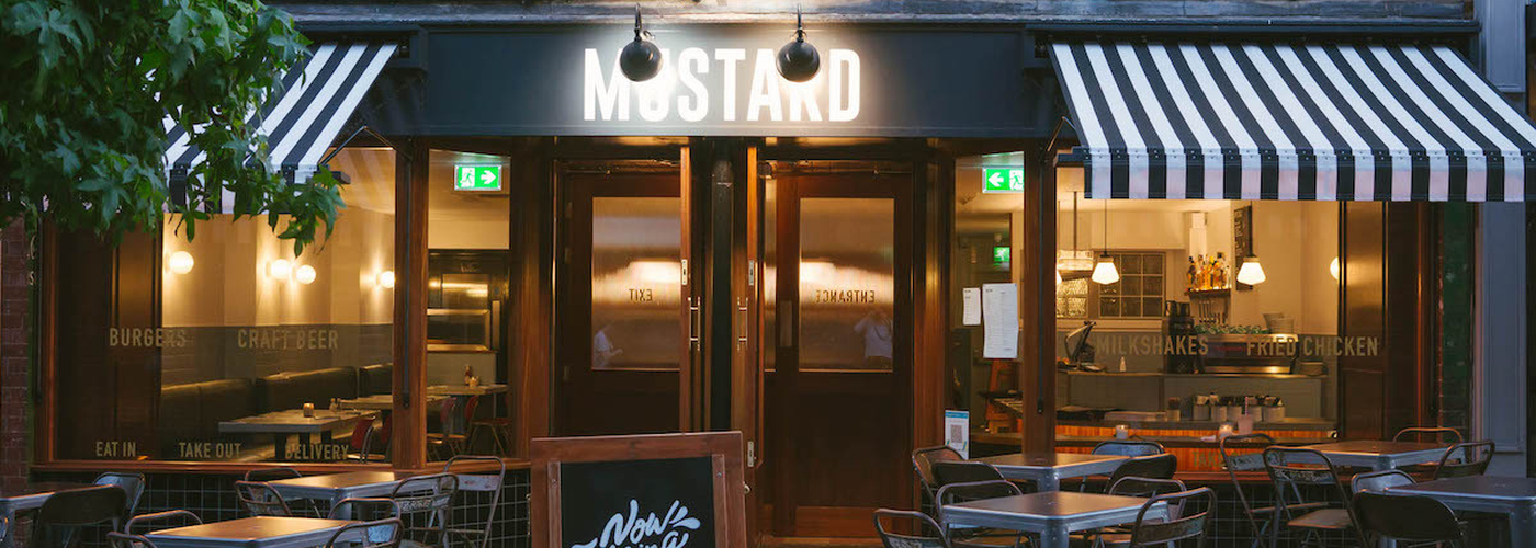The Charming Front Of Mustard Diner In Altrincham Manchester Complete With Stripe Awning And Bistro Style Doors