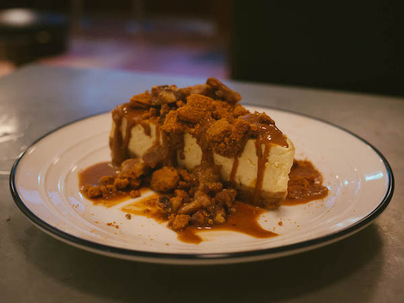 The Lotus Biscoff Cheesecake With Candied Nuts And Caramel Sauce At Mustard Diner In Altrincham
