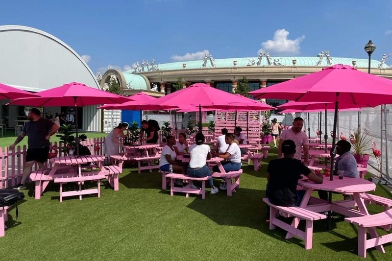 Boujee Pop Up For Summer At The Trafford Centre With Pink Picnic Tables And Umbrellas 1200 800