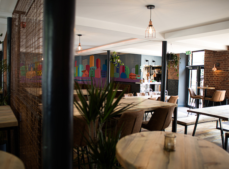 New Interior With Colourful Wall Frieze And Exposed Brick At The Refurbished Joshu Brooks Manchester