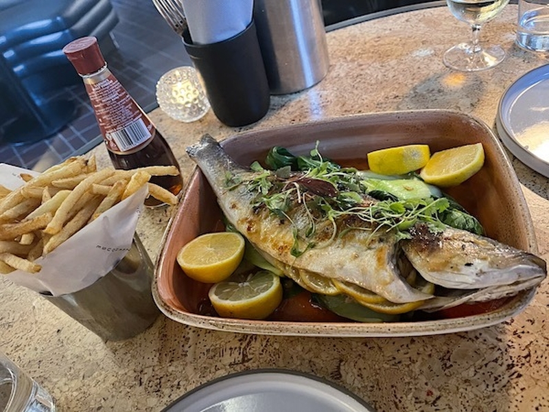 Whole Seabass In Earthenware Dish With Skinny Fries At Ducie Street Warehouse Manchester