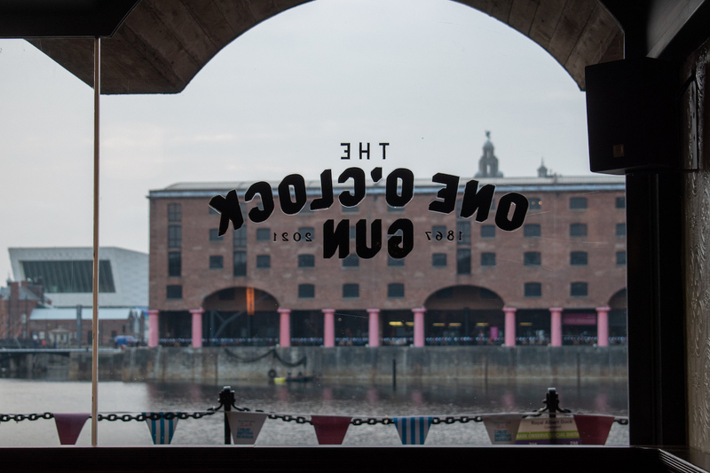 The Front Window Of The One O Clock Gun Pub Situated In Liverpools Royal Albert Dock Next To Maray