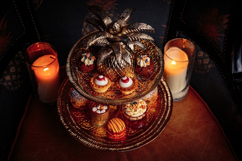 Grand Pacific Afternoon Tea From Above On A Gold Art Deco Cake Stand