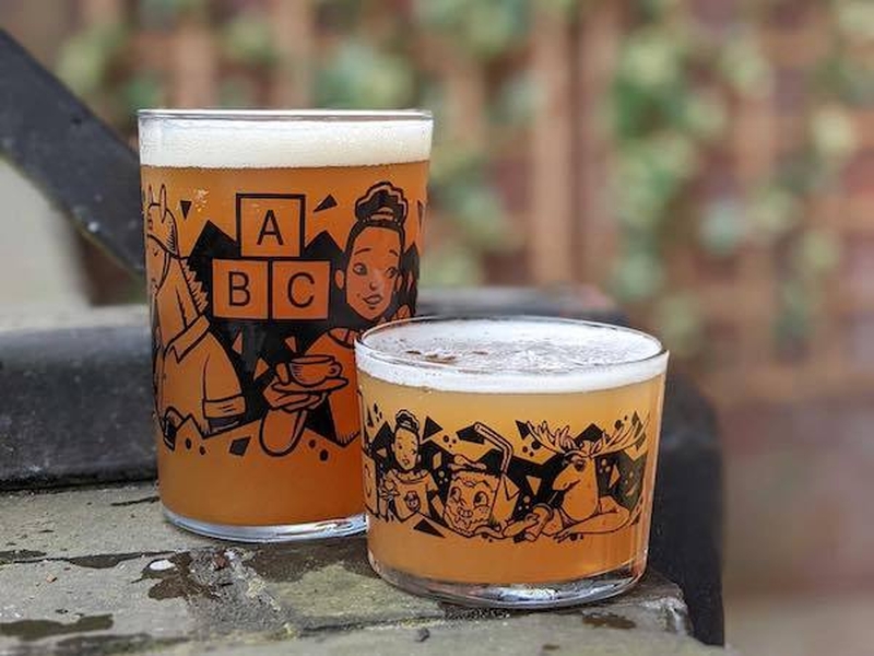 Two Glasses From The Alphabet Merch Selection Which Can Be Bought At Their Manchester Hq And Online