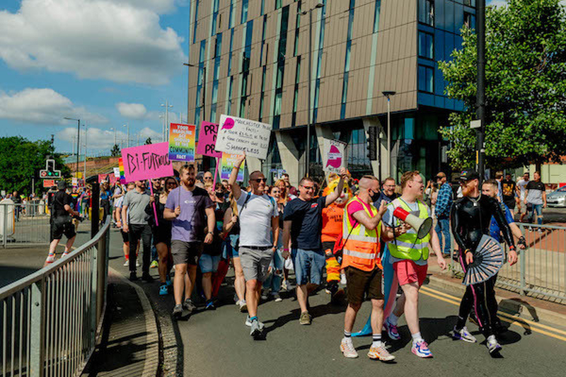 A Group Of Protesters March Through Manchester One With A Sign That Says Bifurious At Manchester Pride Weekend 2021 Chris Keller Jackson
