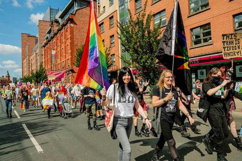 A Group Of Protesters March With Rainbow Flags At Manchester Pride Protest 2021 Chris Keller Jackson
