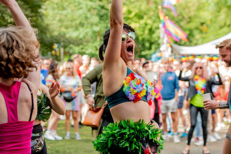 A Woman Shouts And Raises Her Arm In Sackville Gardens At Manchester Pride 2021 Chris Keller Jackson
