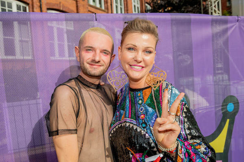 A Man In Mesh And A Woman In Colourful Sequin Top Doing Peace Sign At Manchester Pride 2021 Chris Keller Jackson