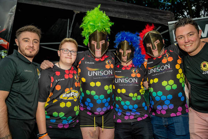 A Group Of Men In Centurean Masks And Rainbow Sports Tops At Manchester Pride 2021 Chris Keller Jackson