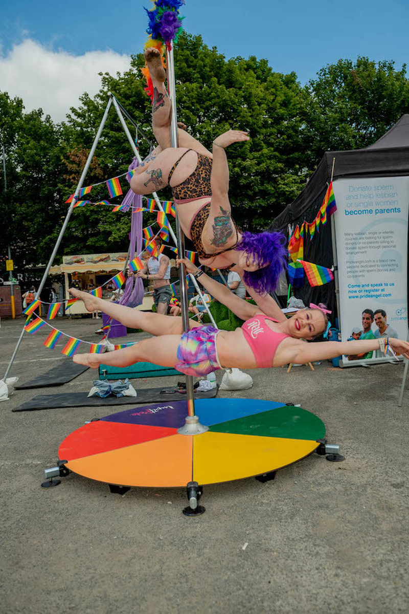 Women With Colourful Hair And Bikinis Dance On A Rainbow Pole At Manchester Pride 2021 Chris Keller Jackson