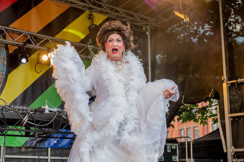 A Drag Queen In A Wehite Feather Boa Dress At Manchester Pride 2021 Chris Keller Jackson