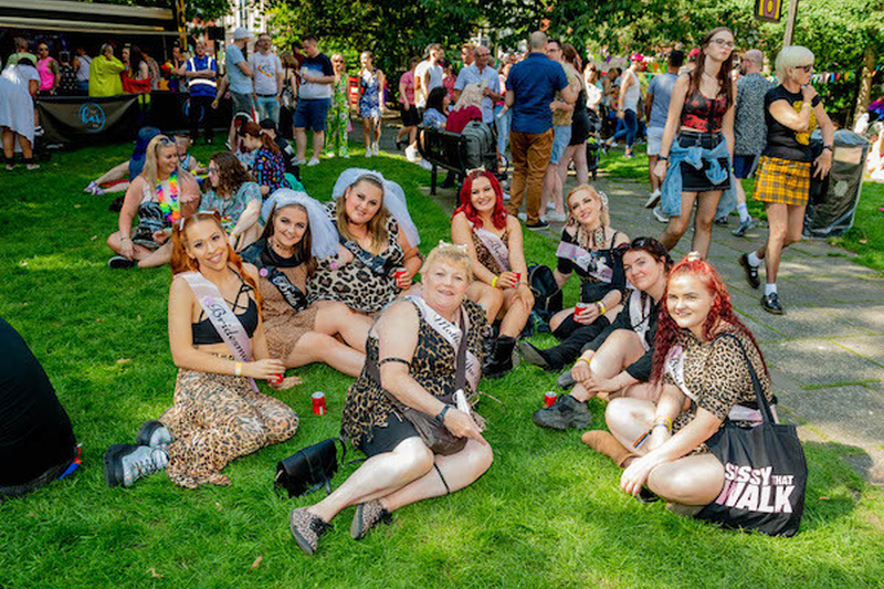 A Hen Party Wearing Leopard Print Sit On The Grass At Manchester Pride 2021 Chris Keller Jackson