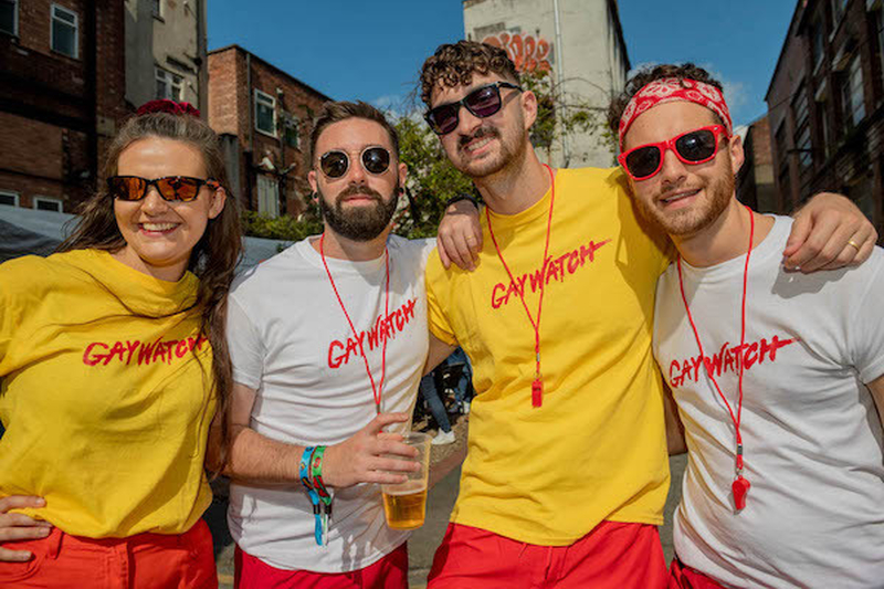 Men And Women In Yellow Red And White Gaywatch T Shirts At Manchester Pride 2021 Chris Keller Jackson