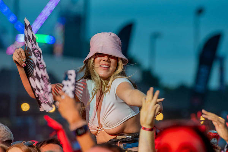 A Woman With A Fan In The Crowd At Manchester Pride 2021 Chris Keller Jackson