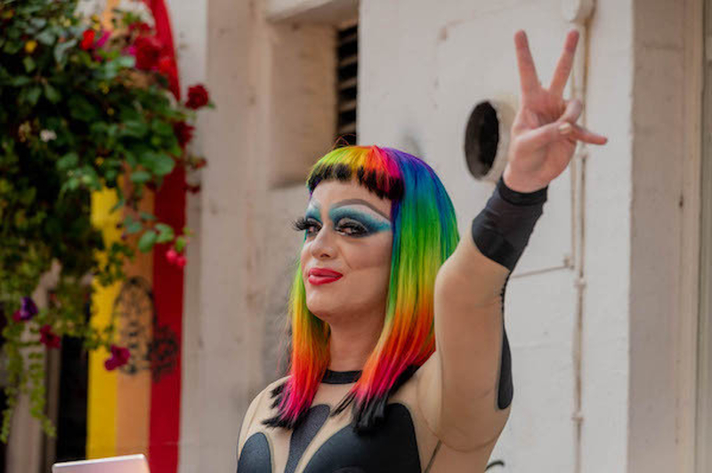 A Person In Drag Make Up And A Rainbow Wig At Manchester Pride 2021 Chris Keller Jackson