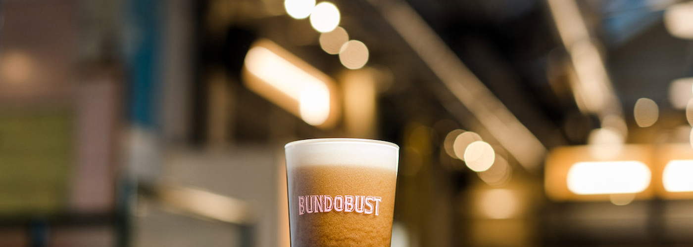 A Pint Of Bundobust Chaitro Against The Backdrop Of The New Brewery