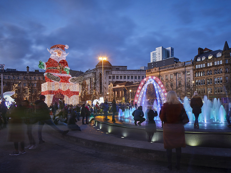 A Massive Santa Made Of Lights At Manchester Christmas Markets In Piccadilly Gardens
