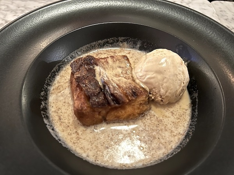 Bread And Butter Pudding With Charcoal Infused Custard And Whisky Syrup Sixes Cricket