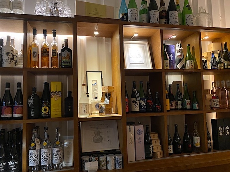 Shelves Of Wine And Sake At The Sparrows Restaurant Manchester