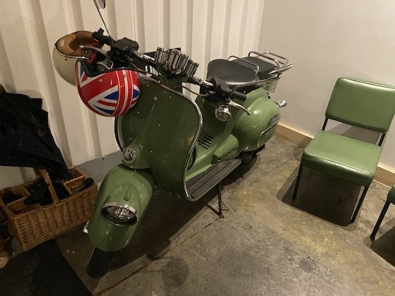 A Khaki Green Vintage Motorcycle At The Sparrows Manchester