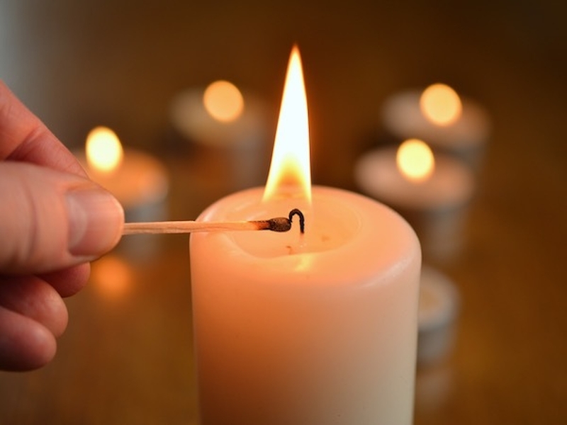 A Homemade Candle Being Lit