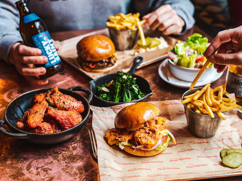 A Spread At The Blues Kitchen On Quay Street In Manchester Featuring Southern Bbq Classics Like Wings And Burgers