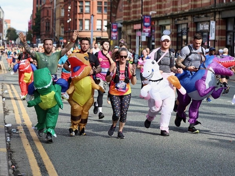 Runners in fancy dress at the Therme Manchester Marathon in 2021