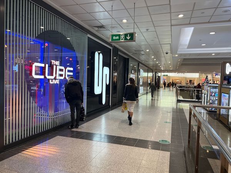 A Passer By Peers In To The Cube At Manchester Arndale