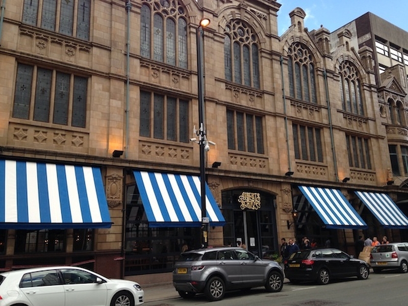 The Exterior Of Alberts Schloss On Peter Street In Manchester With Albert Hall Above