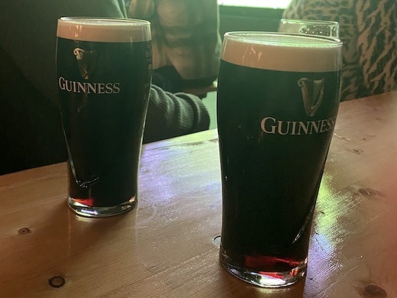 Two Pints Of Guinness At A Venue In Manchester