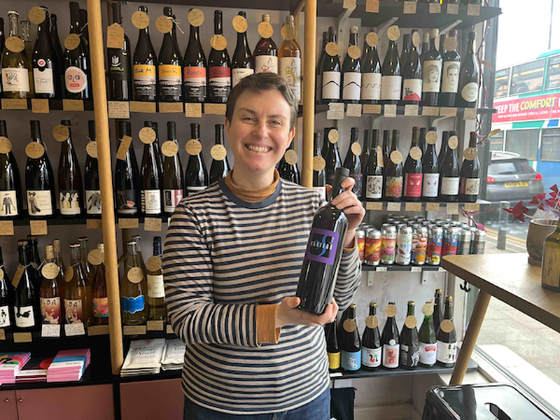 Caroline Dubois Smiles And Holds A Bottle Of Natural Wine At Isca In Levenshulme