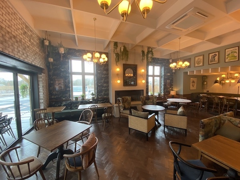 The Dining Room Complete With Fireplace Of The Aviator Pub In Woodford Near Stockport 2