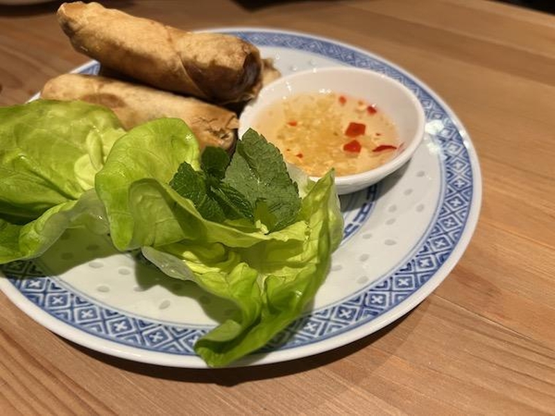Crispy Pork Rolls With Lettuce Mint And Dipping Sauce At Cambodian Restaurant The Mekong Cat