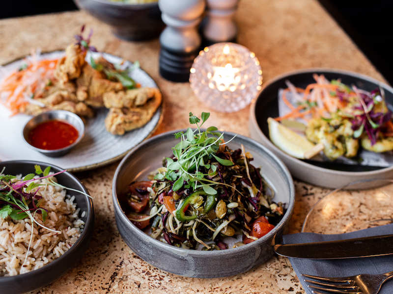 Various Plates Of Burmese Food From Nilas Burmese Kitchen Which Is Popping P At Ducie Street Warehouse Manchester