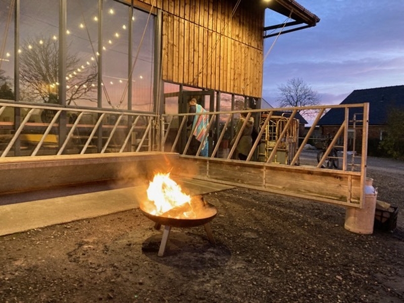 Fire pit outside The Farm Club cafe