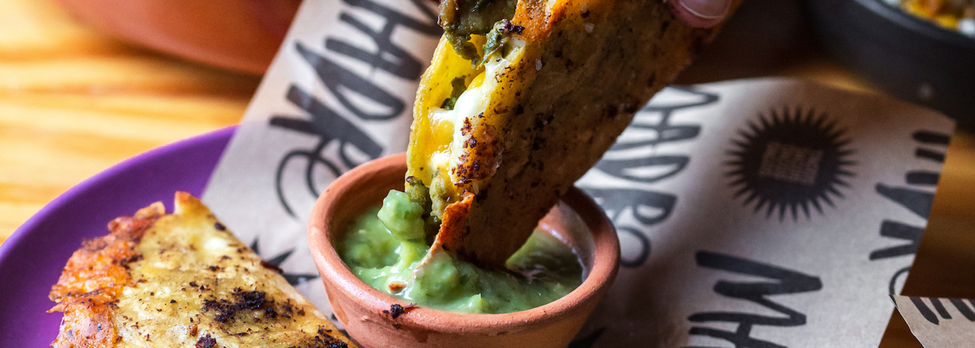 Madre Tacos Being Dipped Into Guacamole Coming Soon To Kampus Manchester
