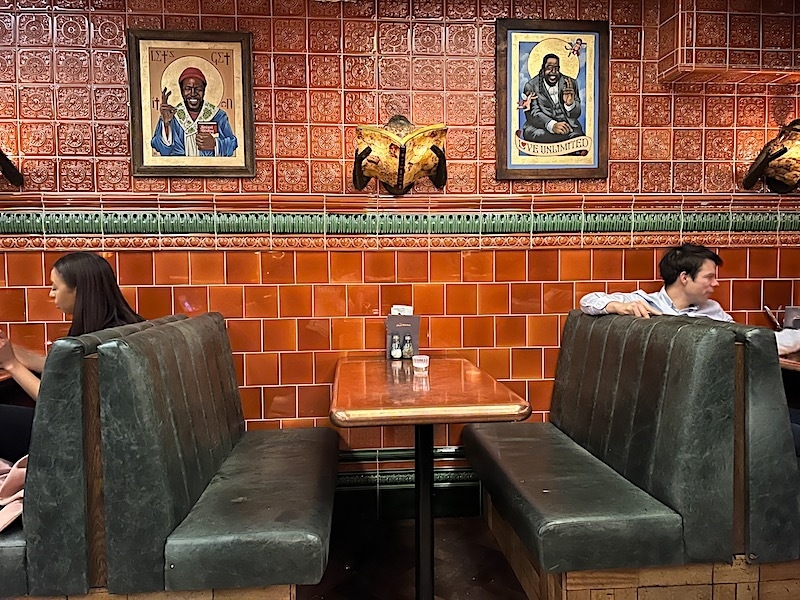Booth With Nice Tiles And Blues Musician Deity Posters At Blues Kitchen Manchester