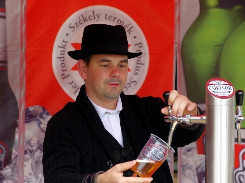 A Man Pouring Beer At Carpathian Basin And Transylvania Festival Gobefest In Manchester