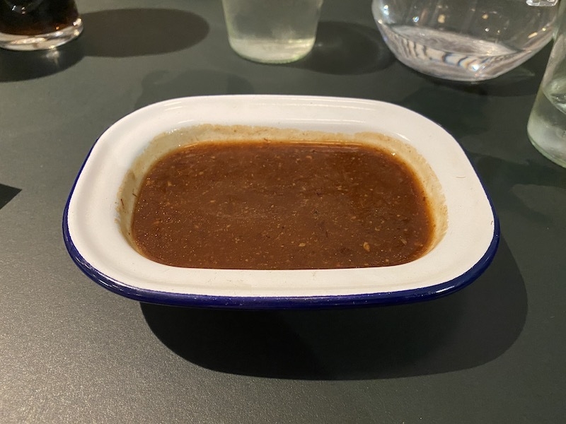 A Dish Of Bacon Gravy At Honest Burger In Manchester