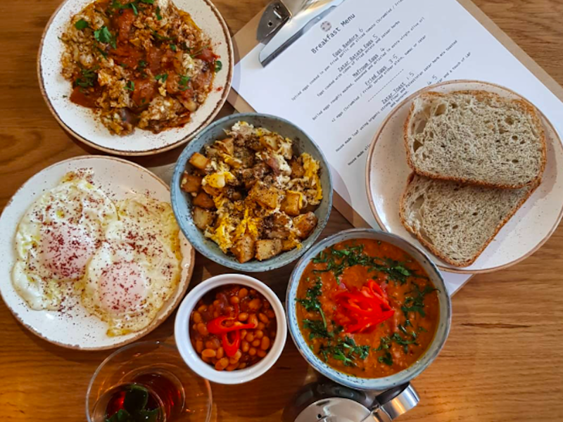 A Flatlay Of Different Dishes At Baity On Wilmslow Road In Didsbury Greater Manchester 2022