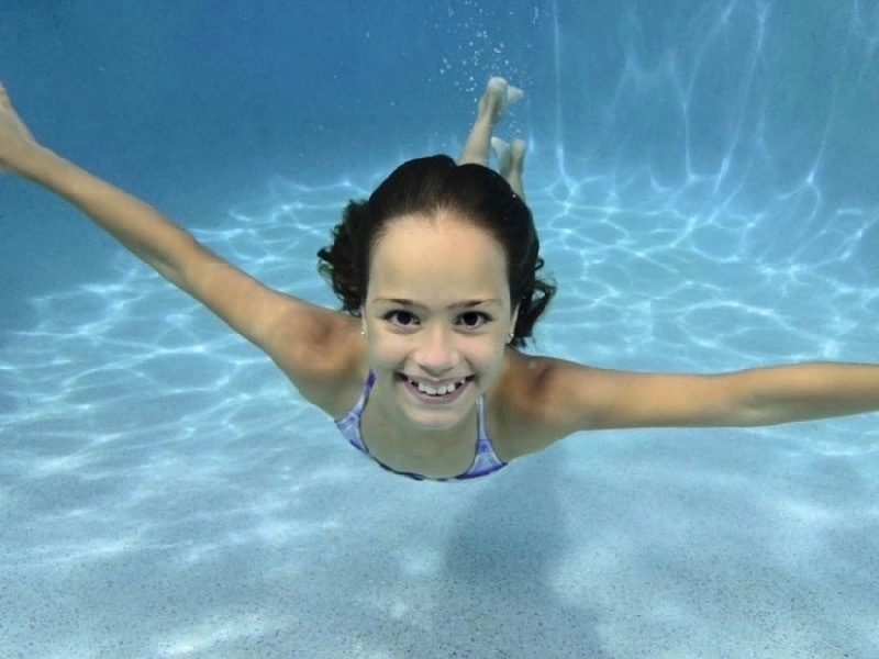 Girl Swimming Underwater