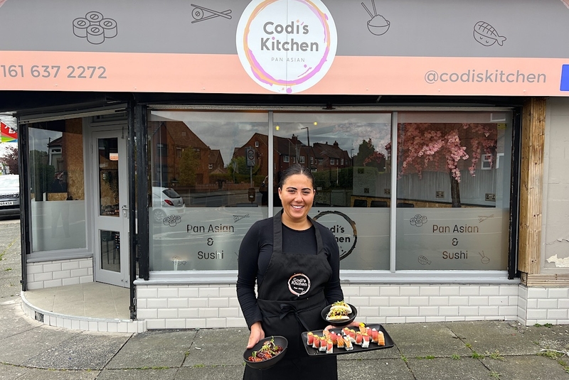 Codi Stands Outside Her New Sushi Restautant In Prestwich North Manchester